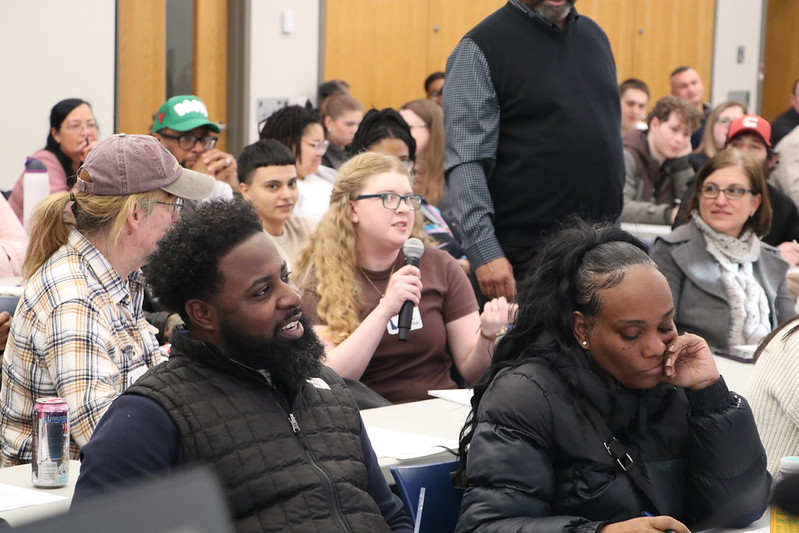 New employee asking a question at the Statewide New Employee Orientation.