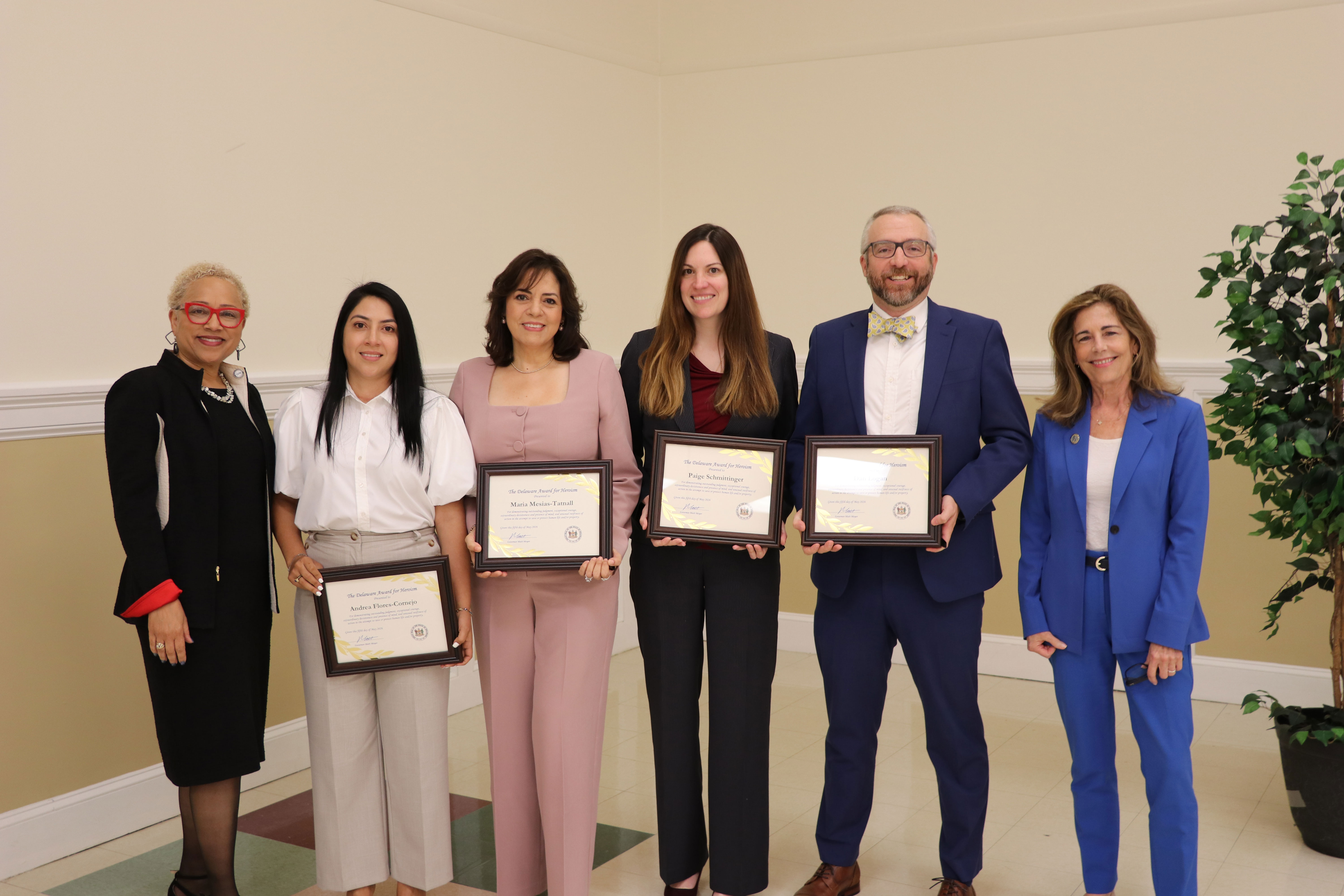 Andrea Flores-Cornejo, Dan Logan, Maria Mesias-Tatnall, Jenna Milecki, Guillermo Santiago, and Paige Schmittinger - Department of Justice