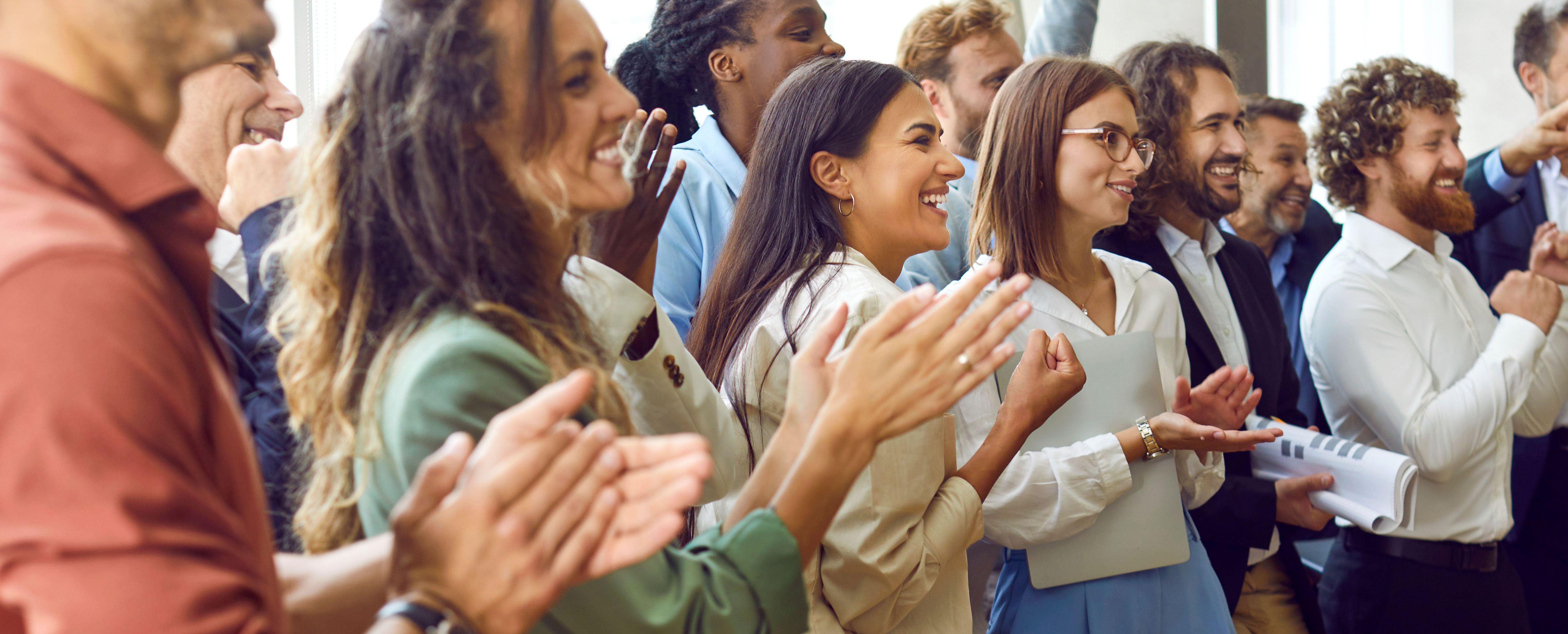 A group of professionals clapping