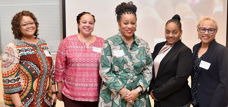 Five women at the Women United in Power event including Women's Advancement and Advocacy Executive Director Sherese Brewington-Carr, Department of Human Resources Deputy Director Lisa Tucker, and Department of Human Resources Secretary Yvonne Gordon.